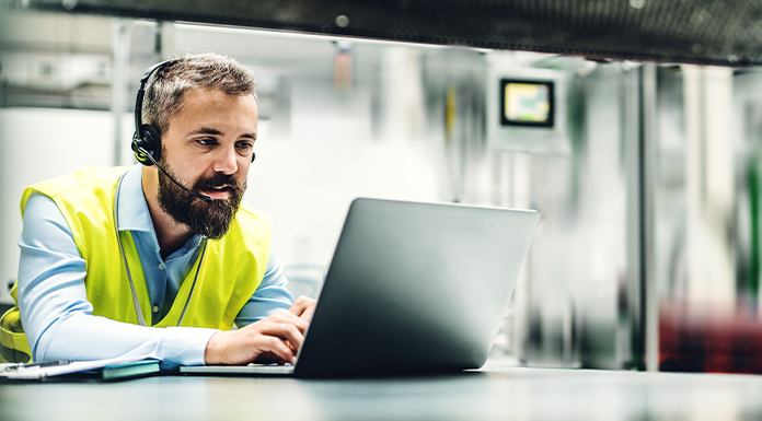 Employee taking an online safety training through Safety OnDemand from ICW Group